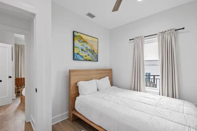 a room with furniture and a wooden floor