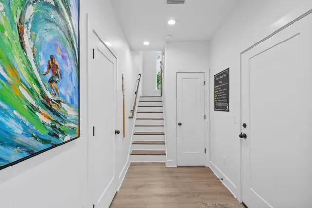 a bedroom with a bed and a television