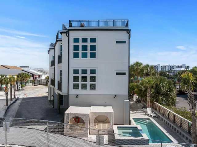 aerial view of a house with a yard