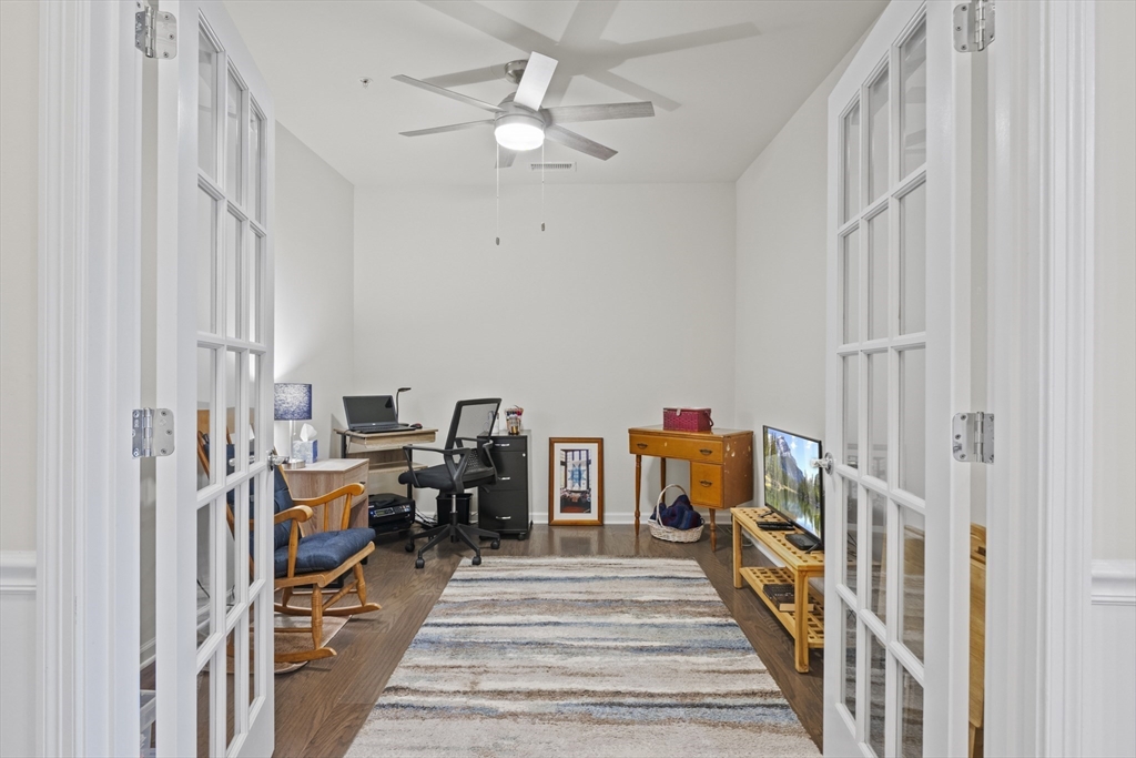 2 Talbot Way, Unit 2208 Westborough, MA 01581 - Photo 11 of 41 a view of a bedroom with workspace and stairs