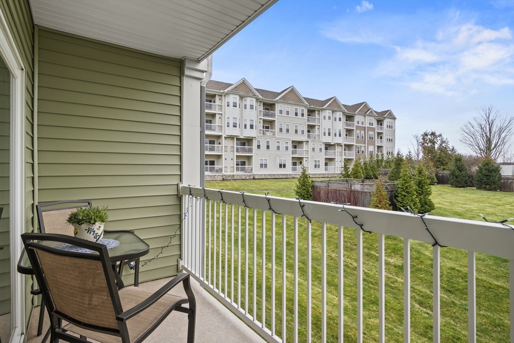 2 Talbot Way, Unit 2208 Westborough, MA 01581 - Photo 20 of 41 a view of a balcony with wooden floor