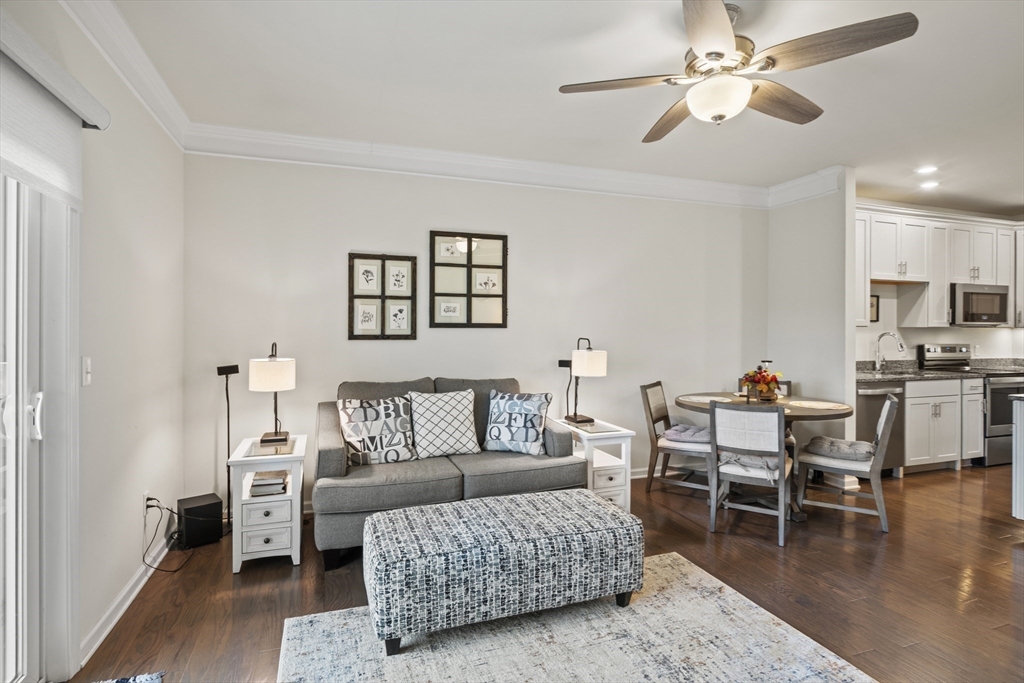 2 Talbot Way, Unit 2208 Westborough, MA 01581 - Photo 8 of 41 a living room with furniture and wooden floor