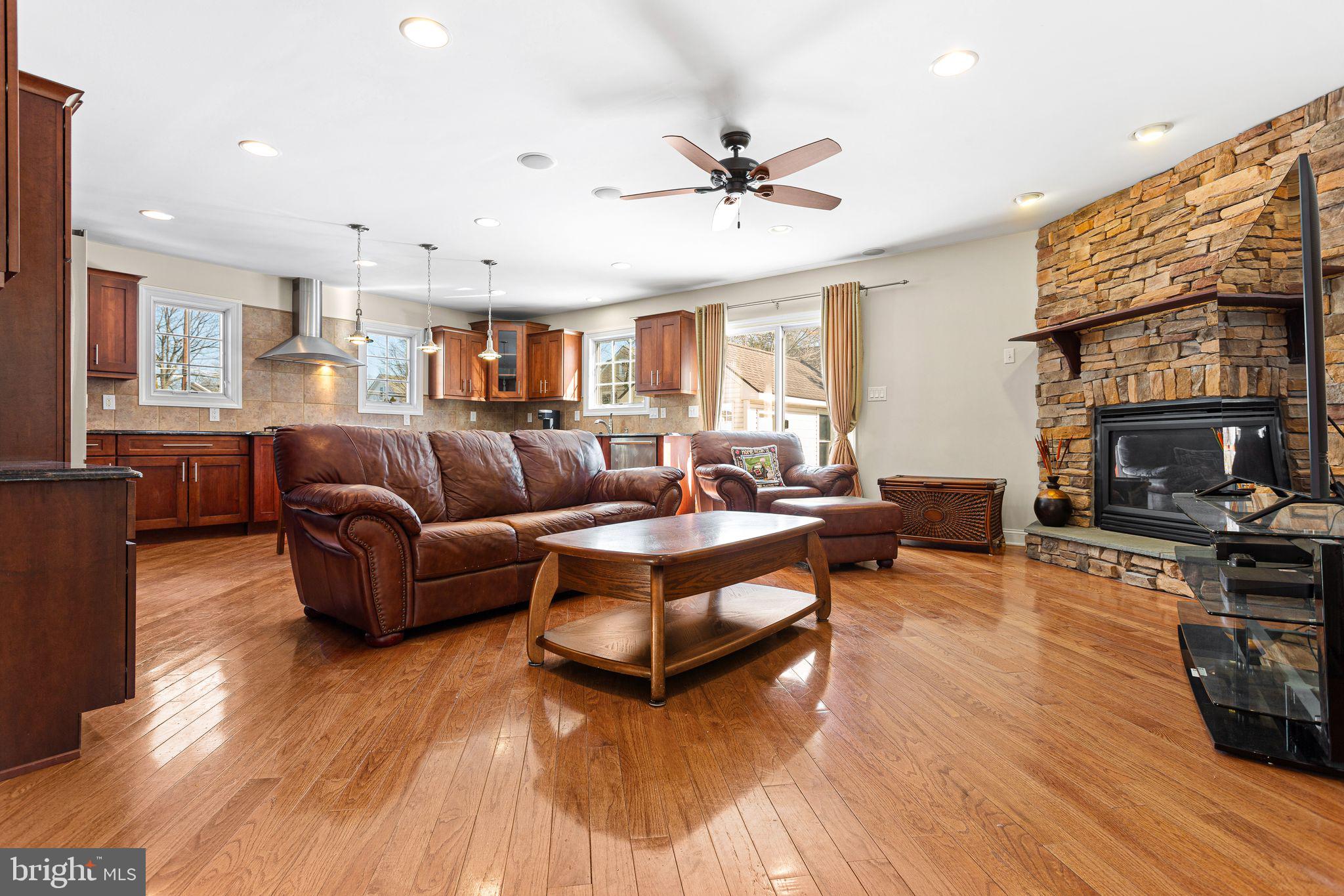 156 Ardmore Avenue Haddonfield, NJ 08033 - Photo 11 of 36 a living room with furniture and a fireplace