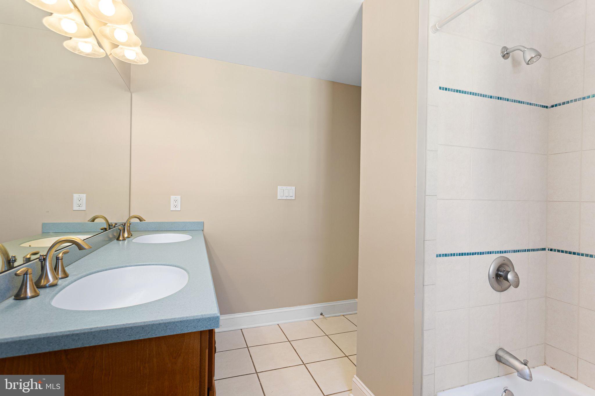 156 Ardmore Avenue Haddonfield, NJ 08033 - Photo 17 of 36 a bathroom with a sink and a mirror