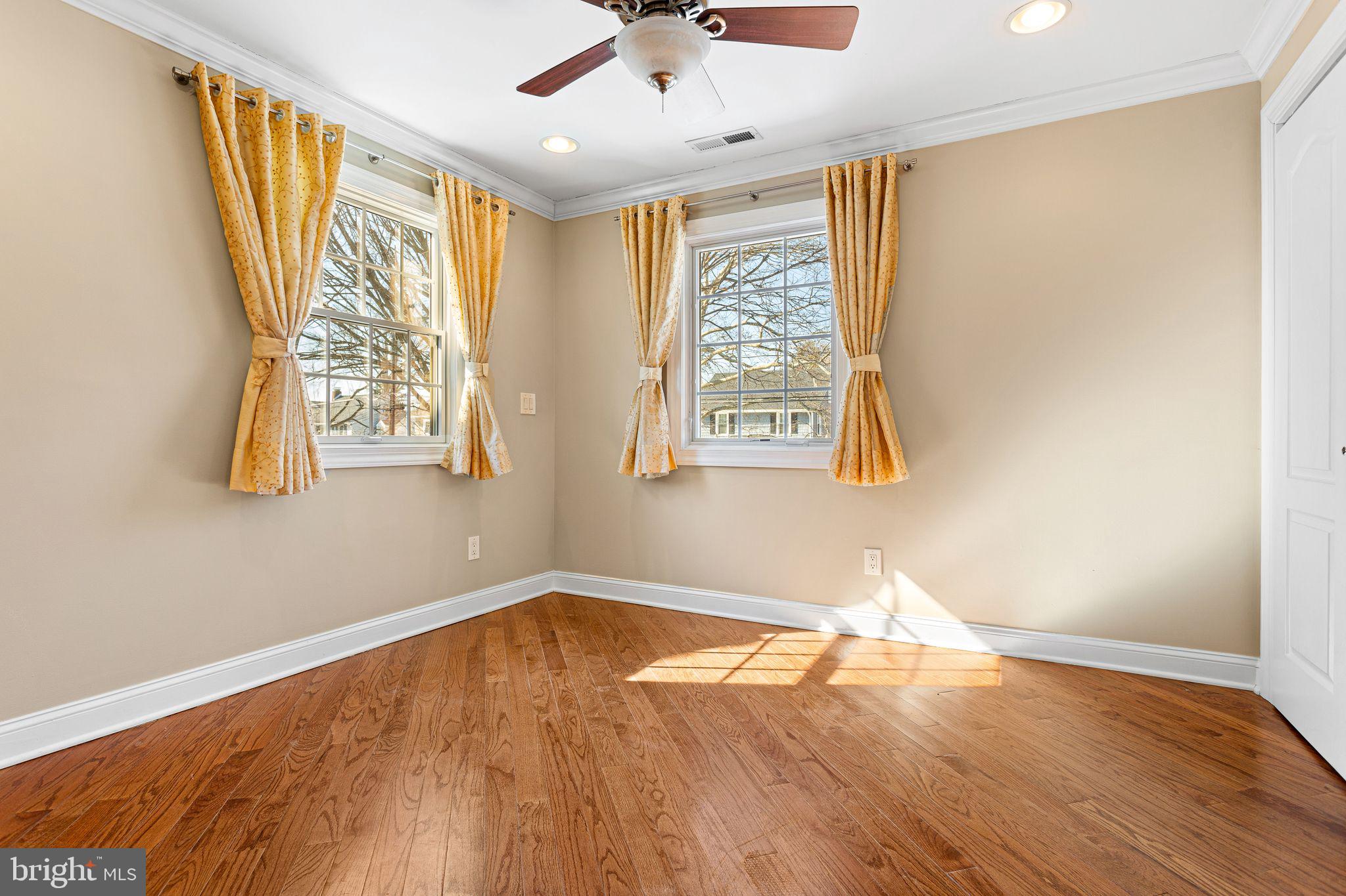 156 Ardmore Avenue Haddonfield, NJ 08033 - Photo 18 of 36 a view of empty room with wooden floor and fan