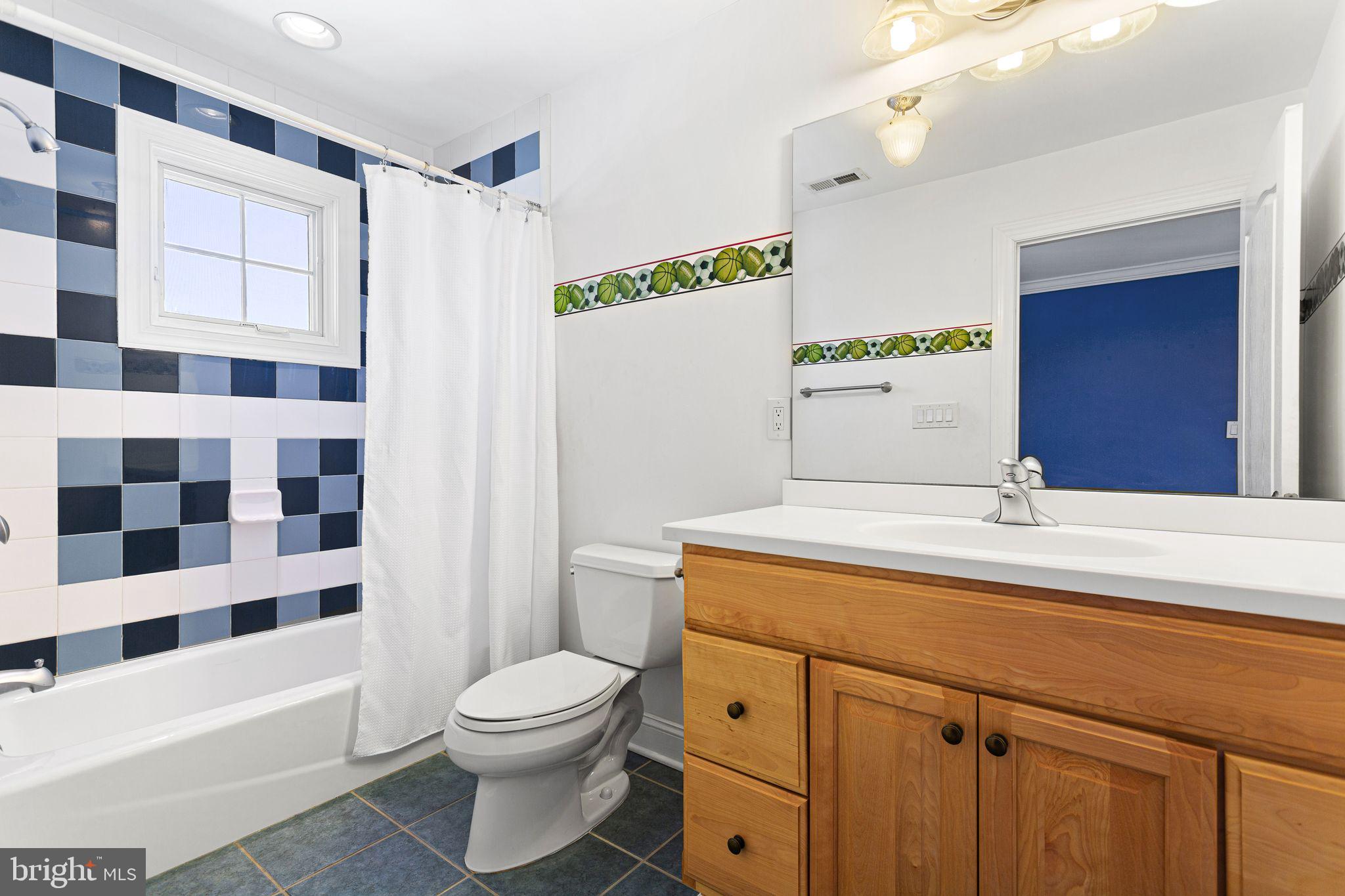 156 Ardmore Avenue Haddonfield, NJ 08033 - Photo 29 of 36 a bathroom with a sink a toilet a shower and a mirror