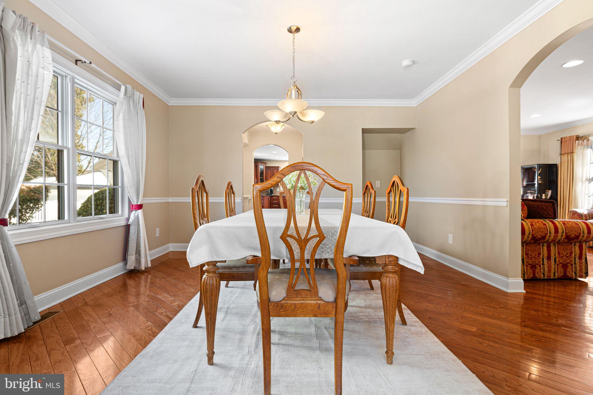 156 Ardmore Avenue Haddonfield, NJ 08033 - Photo 6 of 36 a view of a dining room with furniture and wooden floor
