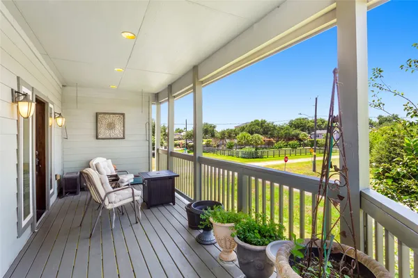 a balcony with an outdoor space