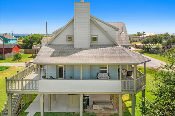 a view of a house with porch and wooden floor