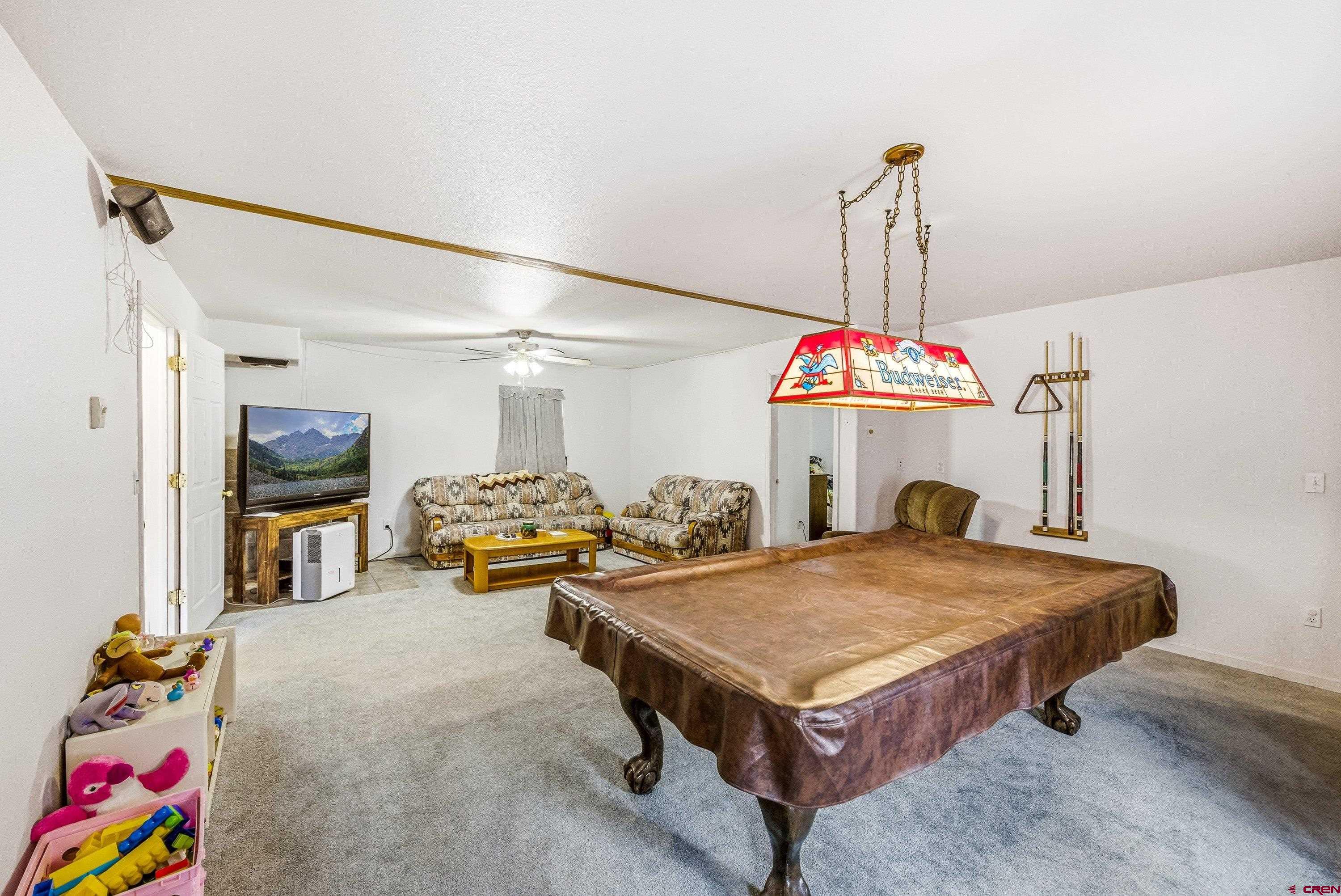 14414 G Road Delta, CO 81416 - Photo 17 of 39 a very nice looking room with a bed