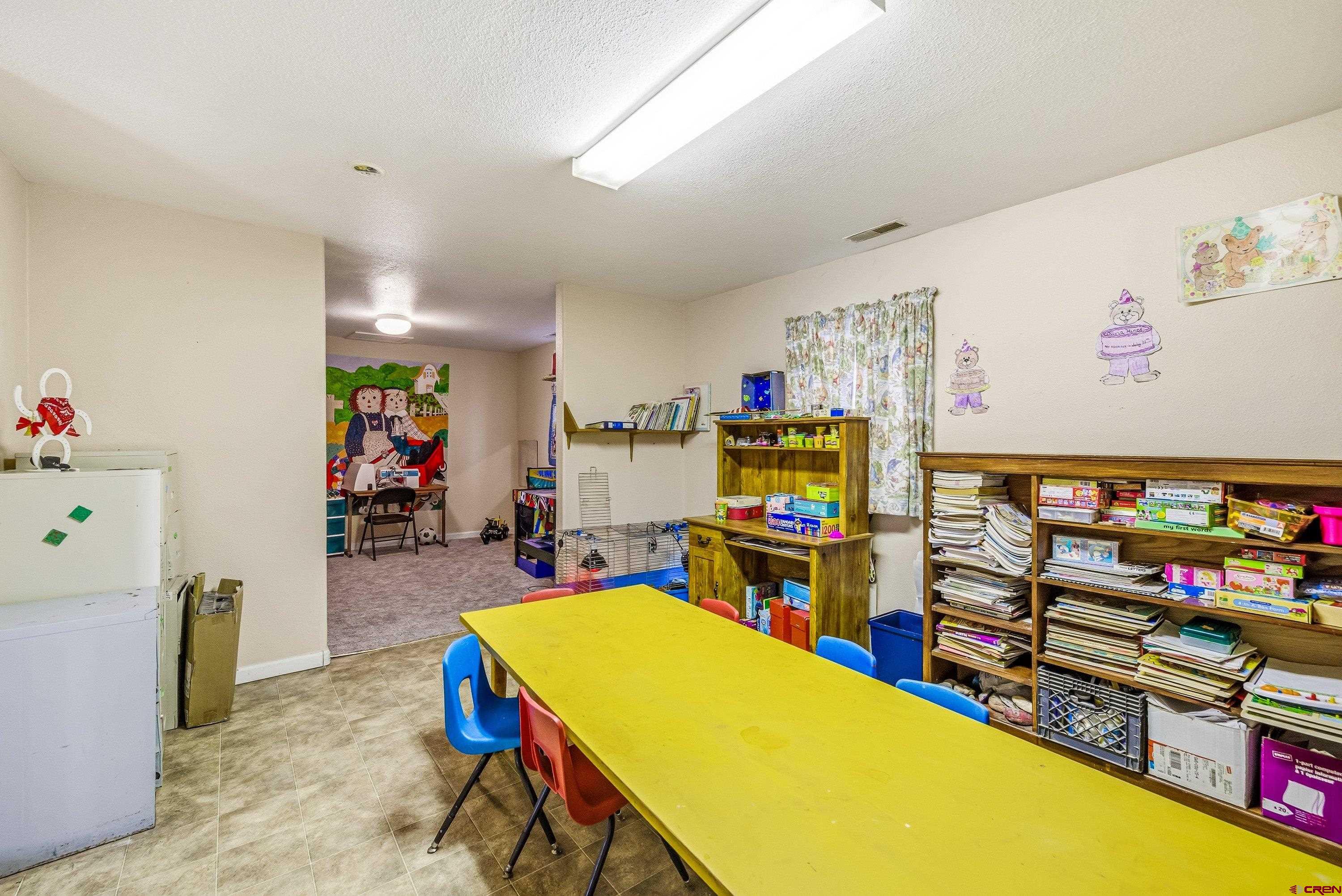 14414 G Road Delta, CO 81416 - Photo 20 of 39 a room with storage and utility