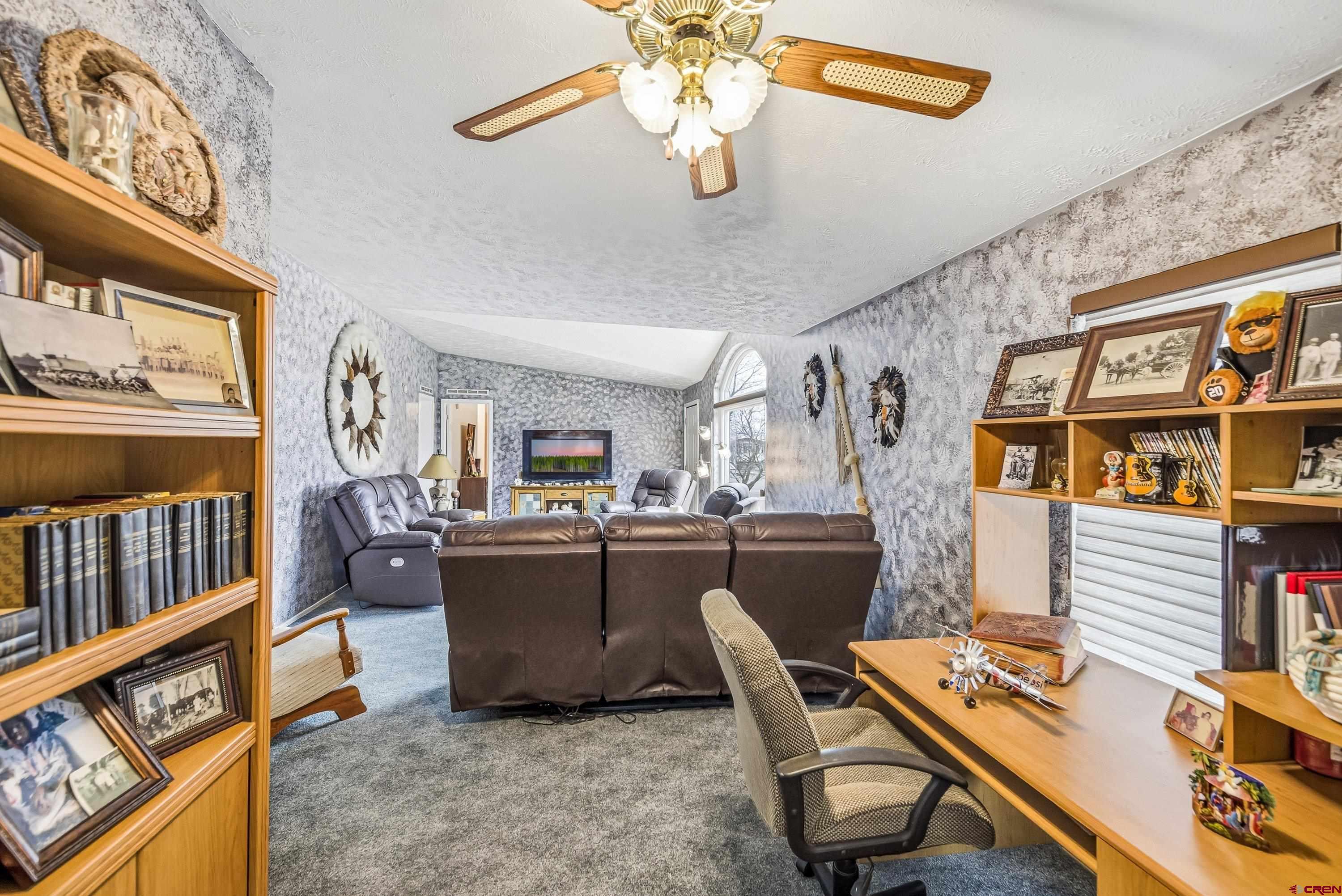 14414 G Road Delta, CO 81416 - Photo 7 of 39 a room with furniture and a window