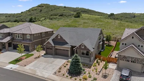 an aerial view of a house with a garden
