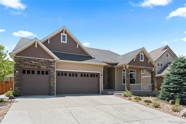 a front view of a house with yard