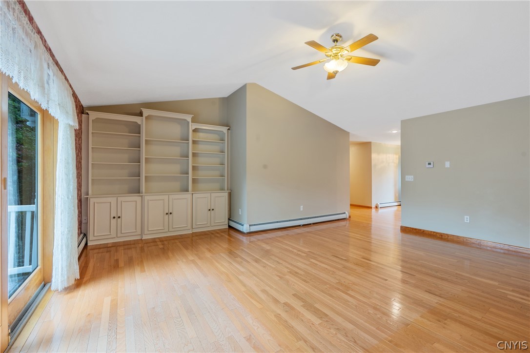 2352 Hunt Road Camillus, NY 13031 - Photo 9 of 43 Vaulted Ceiling and Beautiful Hardwoods