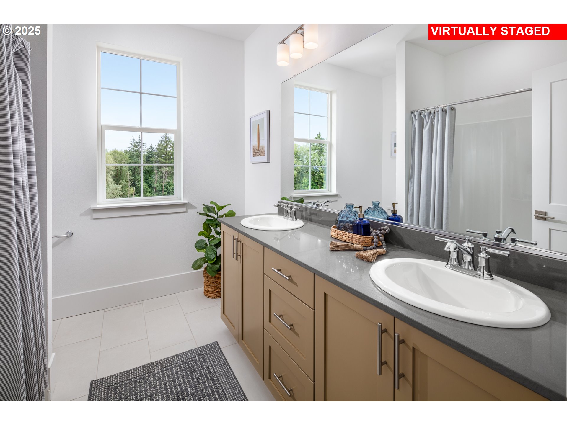 17765 Southwest Maiden Court Beaverton, OR 97007 - Photo 11 of 16 a bathroom with a double vanity sink and a mirror