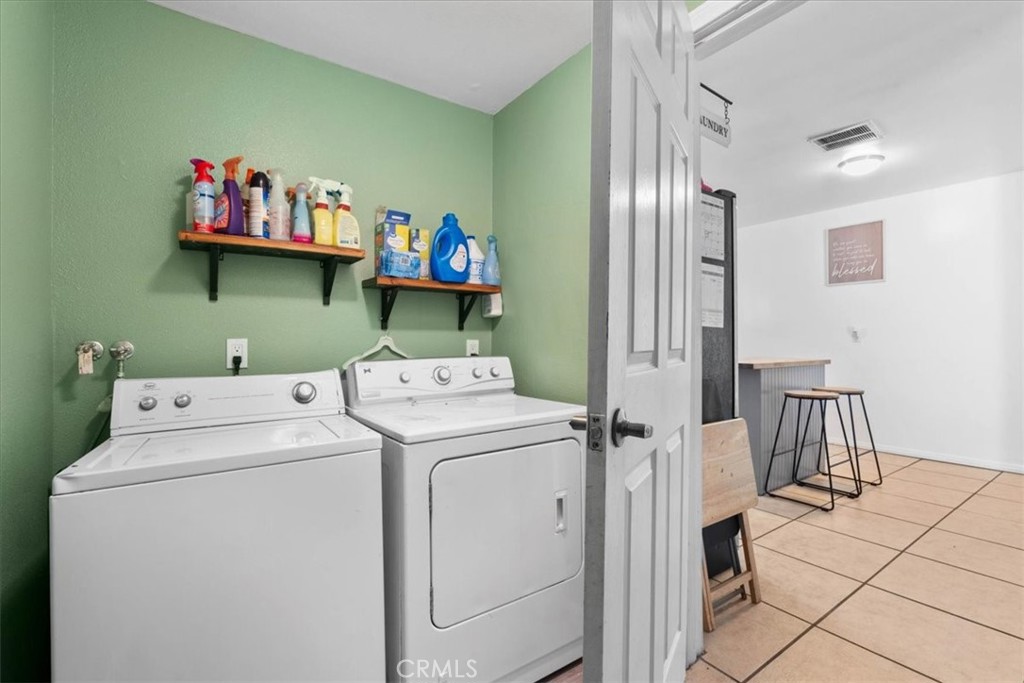 1417 West Marshall Boulevard San Bernardino, CA 92405 - Photo 19 of 39 a utility room with dryer and washer