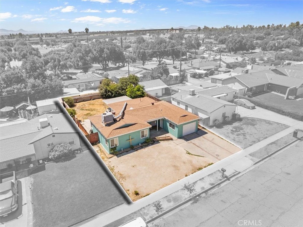 1417 West Marshall Boulevard San Bernardino, CA 92405 - Photo 32 of 39 an aerial view of residential houses with outdoor space