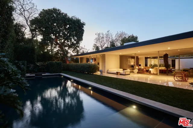 a view of swimming pool from a balcony