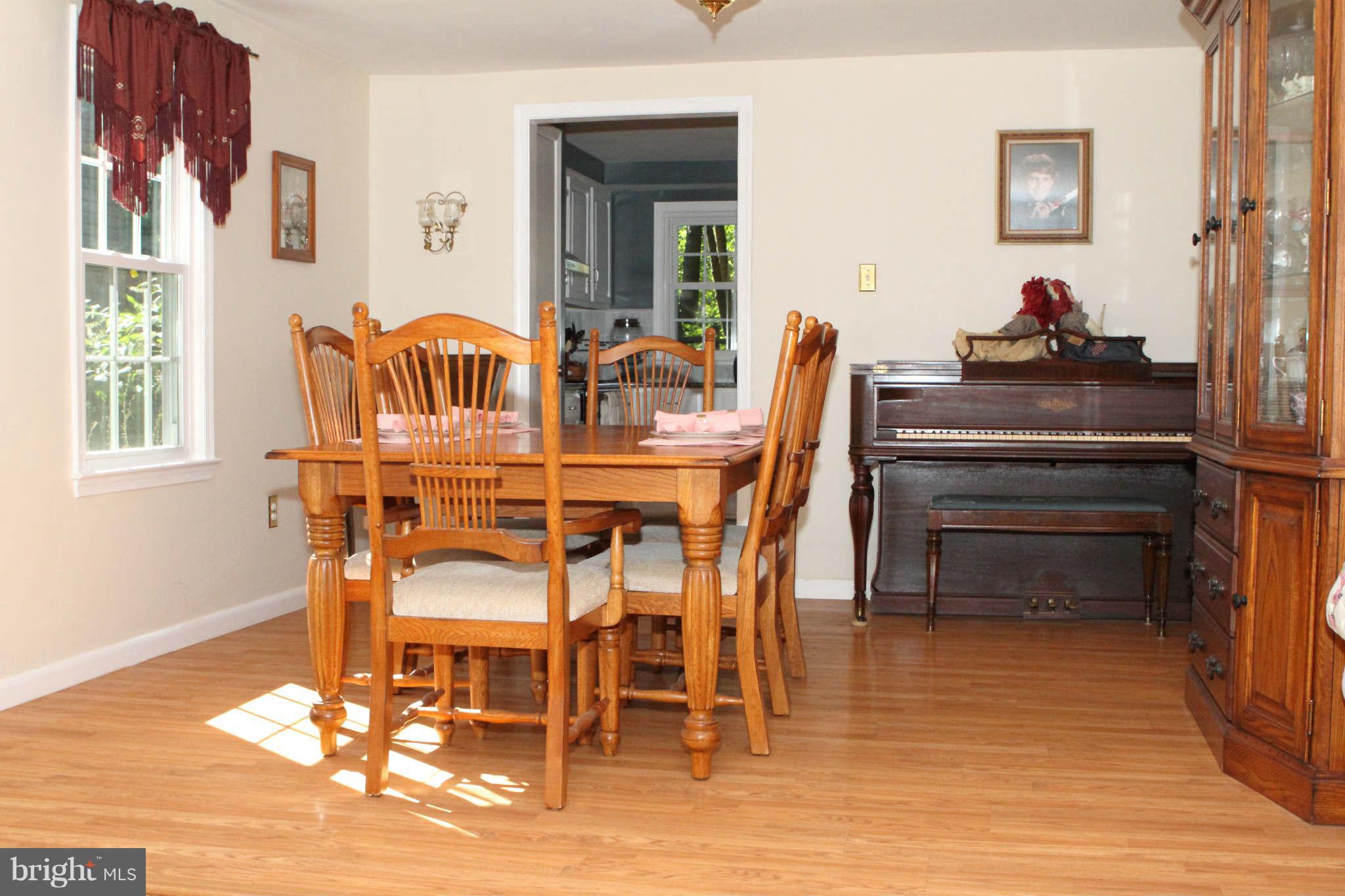 9511 Sweet Grass Ridge Columbia, MD 21046 - Photo 5 of 30 Between Living Room and Kitchen