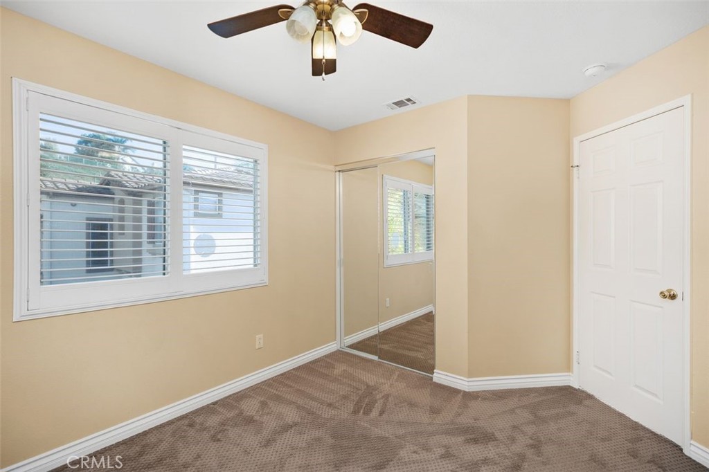 8 Tradition Lane Rancho Santa Margarita, CA 92688 - Photo 13 of 43 a view of an empty room with a window