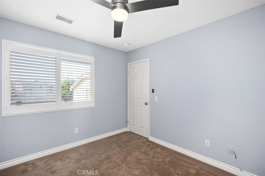 8 Tradition Lane Rancho Santa Margarita, CA 92688 - Photo 16 of 43 an empty room with a window
