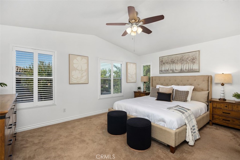 8 Tradition Lane Rancho Santa Margarita, CA 92688 - Photo 18 of 43 a bedroom with a large bed and a window