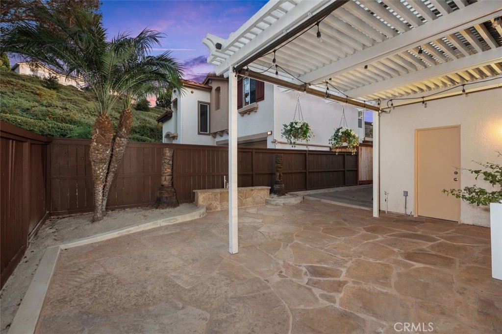 8 Tradition Lane Rancho Santa Margarita, CA 92688 - Photo 27 of 43 a view of a porch