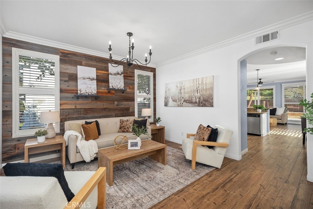 8 Tradition Lane Rancho Santa Margarita, CA 92688 - Photo 3 of 43 a living room with furniture and wooden floor