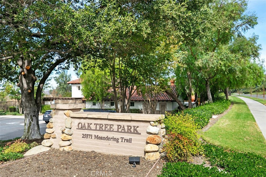 8 Tradition Lane Rancho Santa Margarita, CA 92688 - Photo 35 of 43 a sign on the side of a road