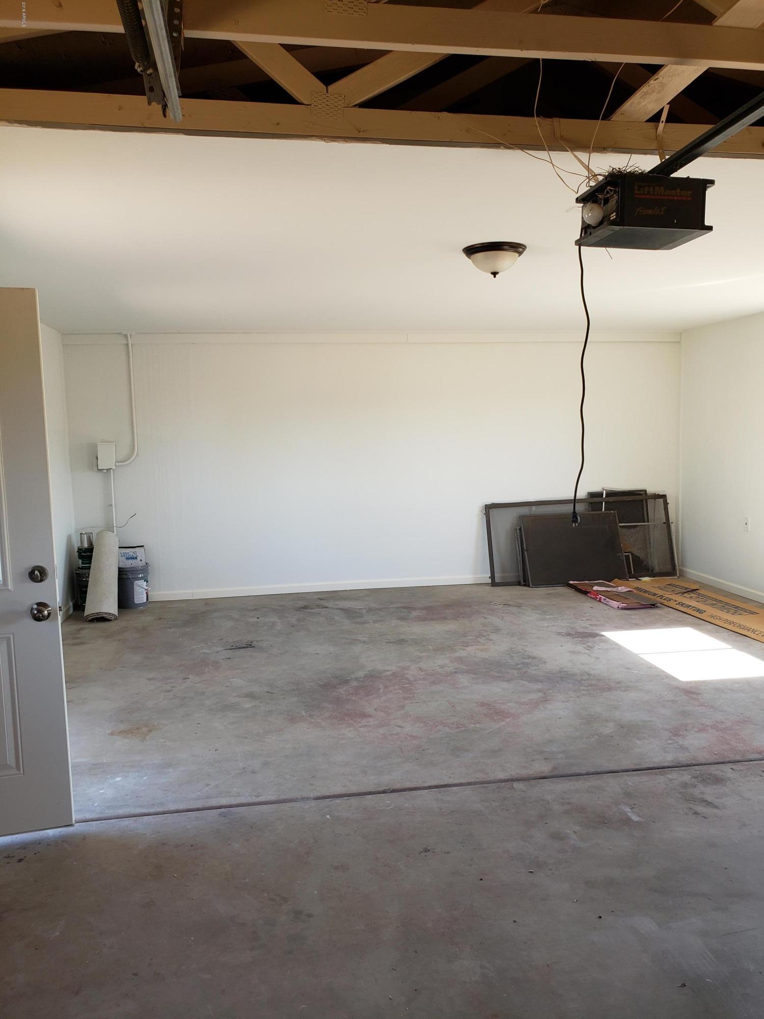 474 North Vista Road Apache Junction, AZ 85119 - Photo 16 of 16 a room with a couch
