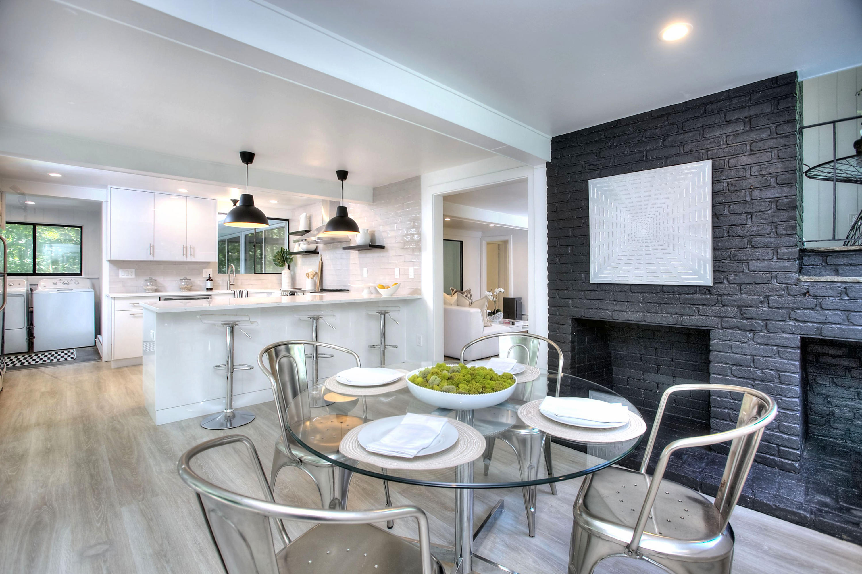 1160 Smith Ridge Road New Canaan, CT 06840 - Photo 8 of 32 a dining room with furniture and a fireplace
