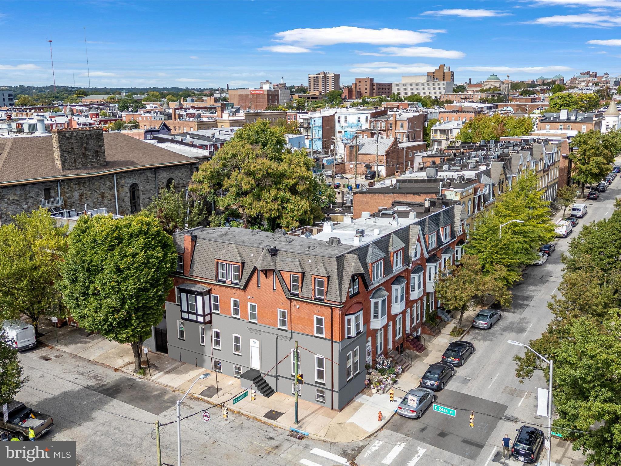 118 East 24th Street, Unit 2 Baltimore, MD 21218 - Photo 13 of 15 a view of a city with tall buildings
