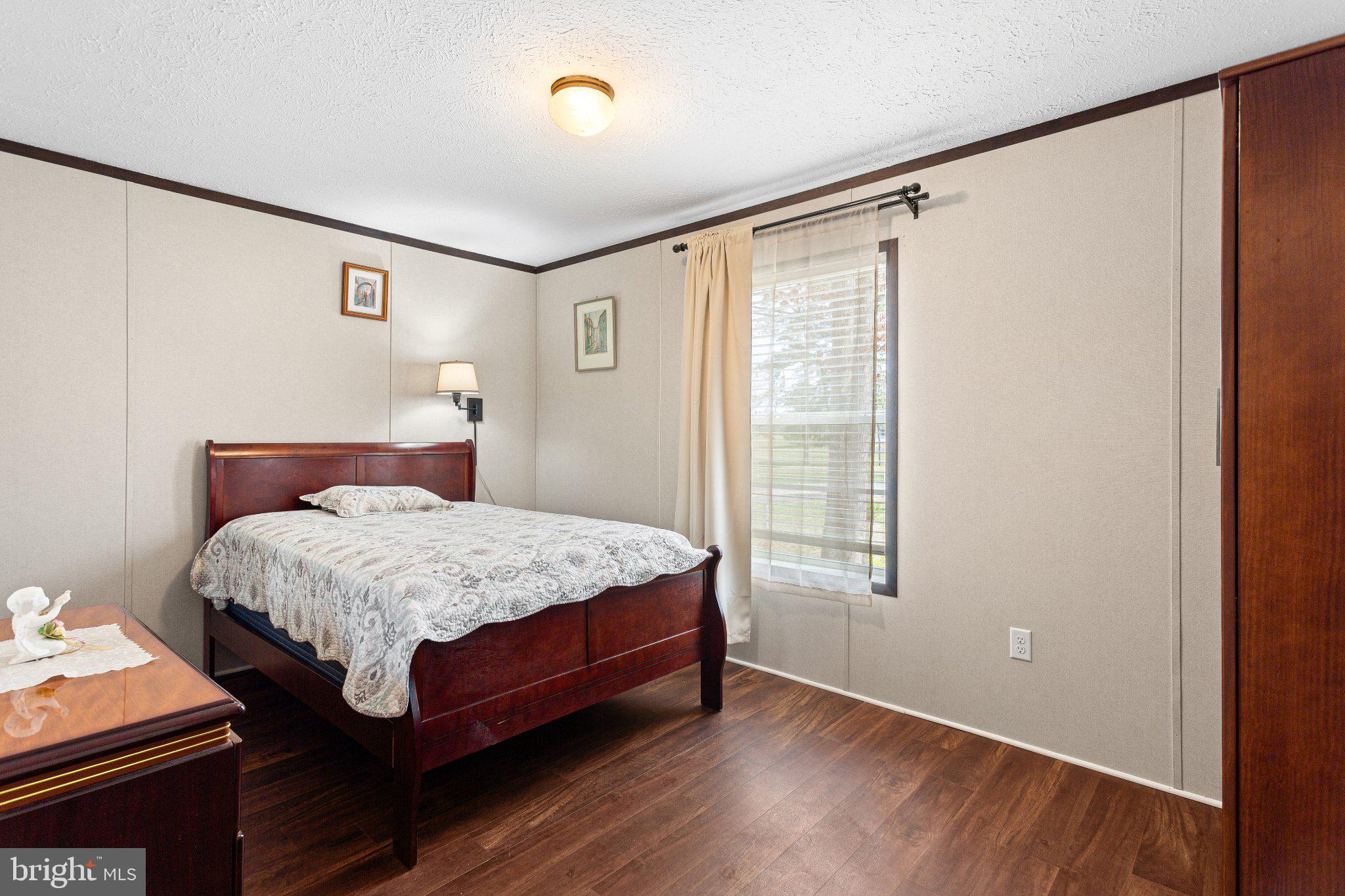 234 Iris Road Mullica Hill, NJ 08062 - Photo 11 of 15 Cozy bedroom with natural light.