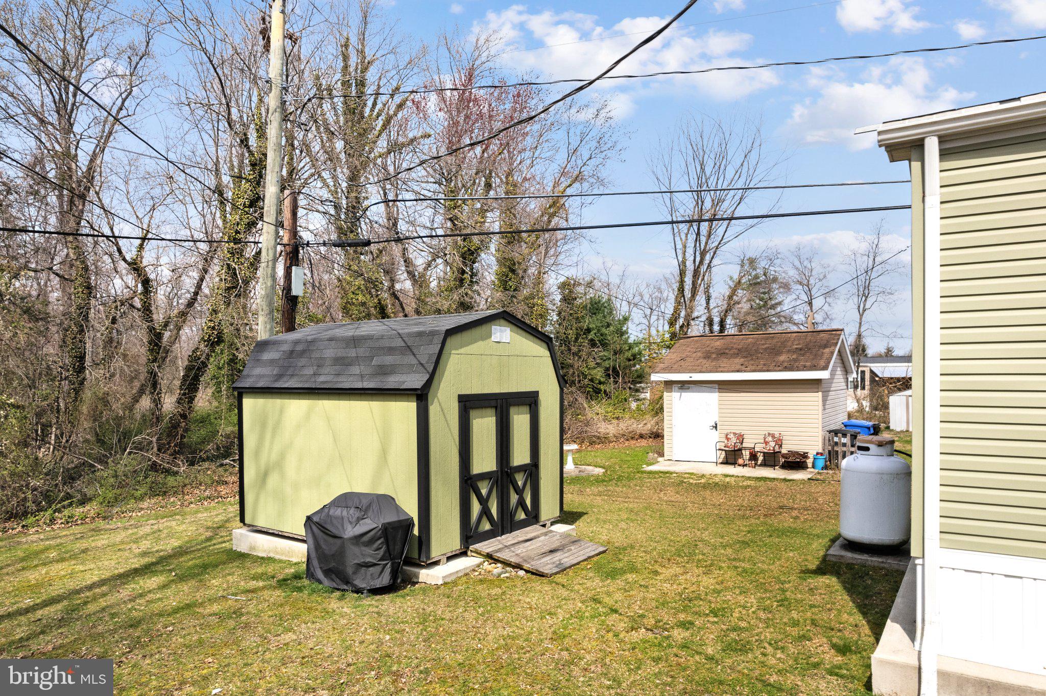 234 Iris Road Mullica Hill, NJ 08062 - Photo 14 of 15 Charming backyard with storage shed.