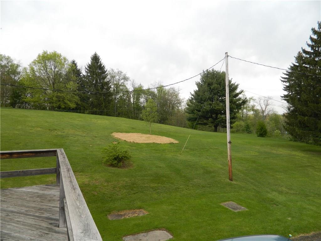 82 Elm Road Hickory, PA 15340 - Photo 5 of 25 The acreage is beautifully manicured. The rear lot extends back into the tree line.