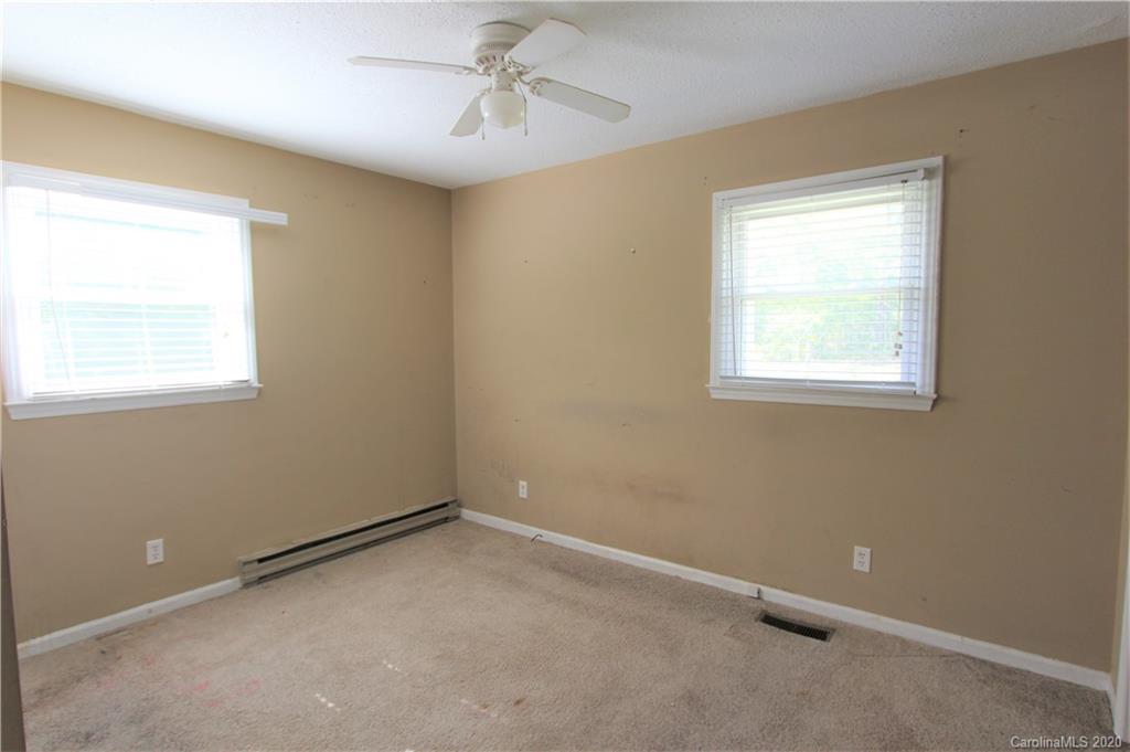308 Sandy Ridge Church Road Morven, NC 28119 - Photo 7 of 10 an empty room with a window