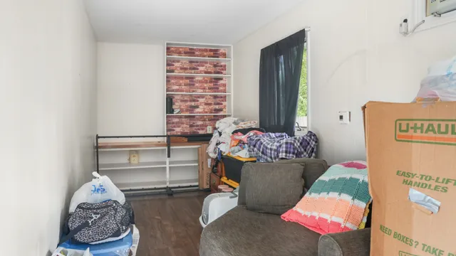 a living room with furniture and a couch