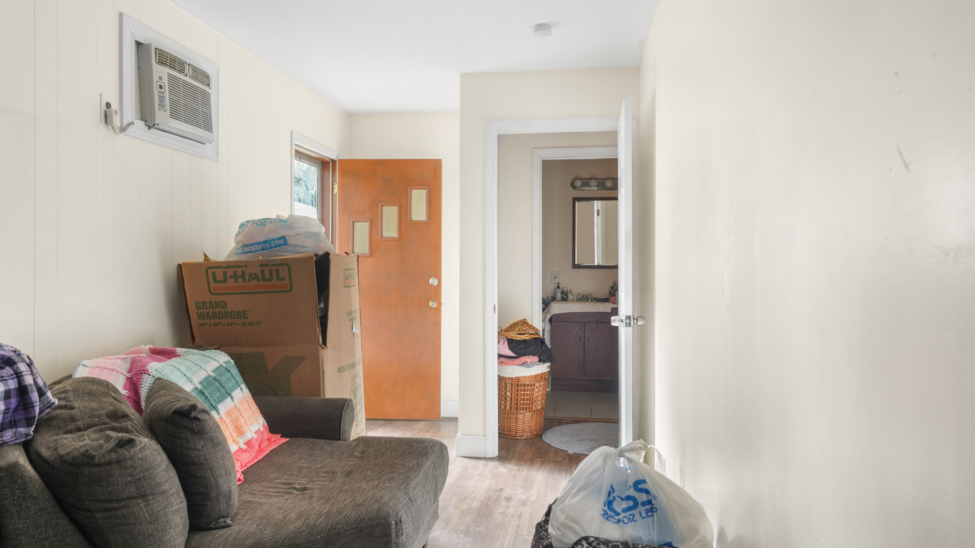 504 East Florida Avenue Urbana, IL 61801 - Photo 12 of 19 a living room with furniture and a gate