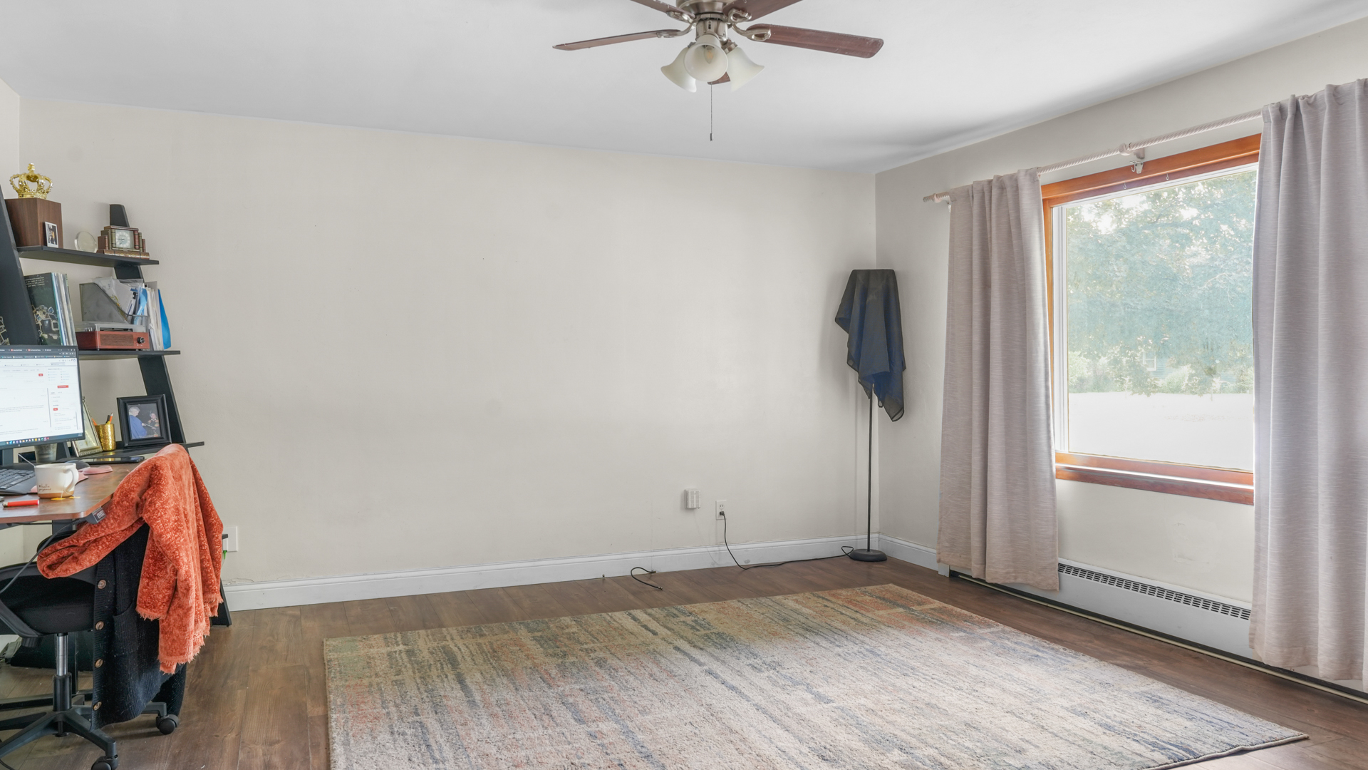 504 East Florida Avenue Urbana, IL 61801 - Photo 14 of 19 wooden floor in an empty room with a window