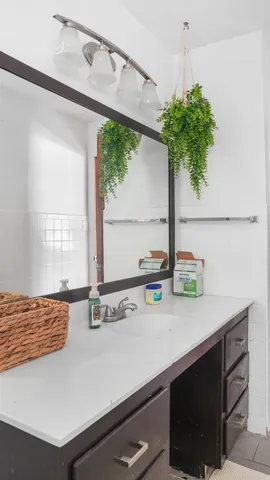 a kitchen with a sink and a window