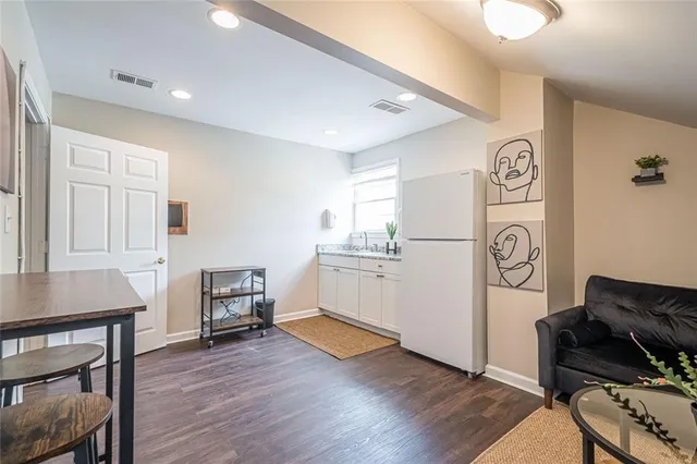 a workspace with furniture and window