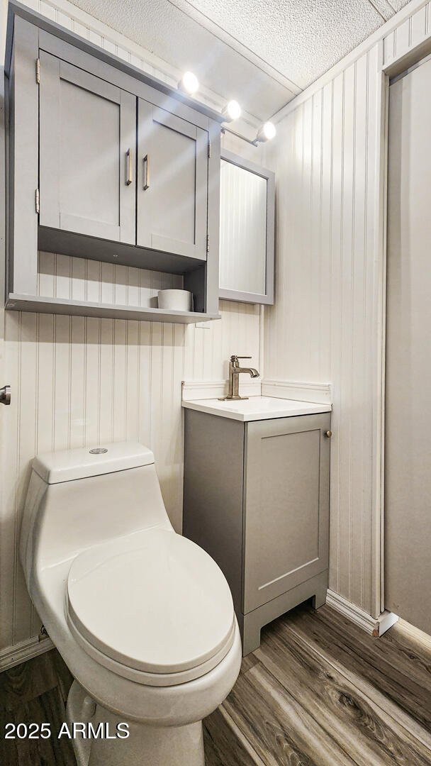 16 North Star Vale Road, Unit 11 Star Valley, AZ 85541 - Photo 14 of 24 a bathroom with a sink a toilet and mirror