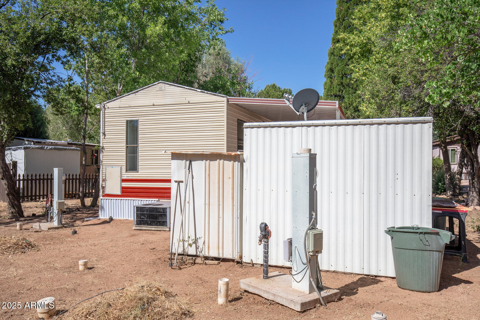 16 North Star Vale Road, Unit 11 Star Valley, AZ 85541 - Photo 22 of 24 a backyard of a house with barbeque oven and outdoor seating