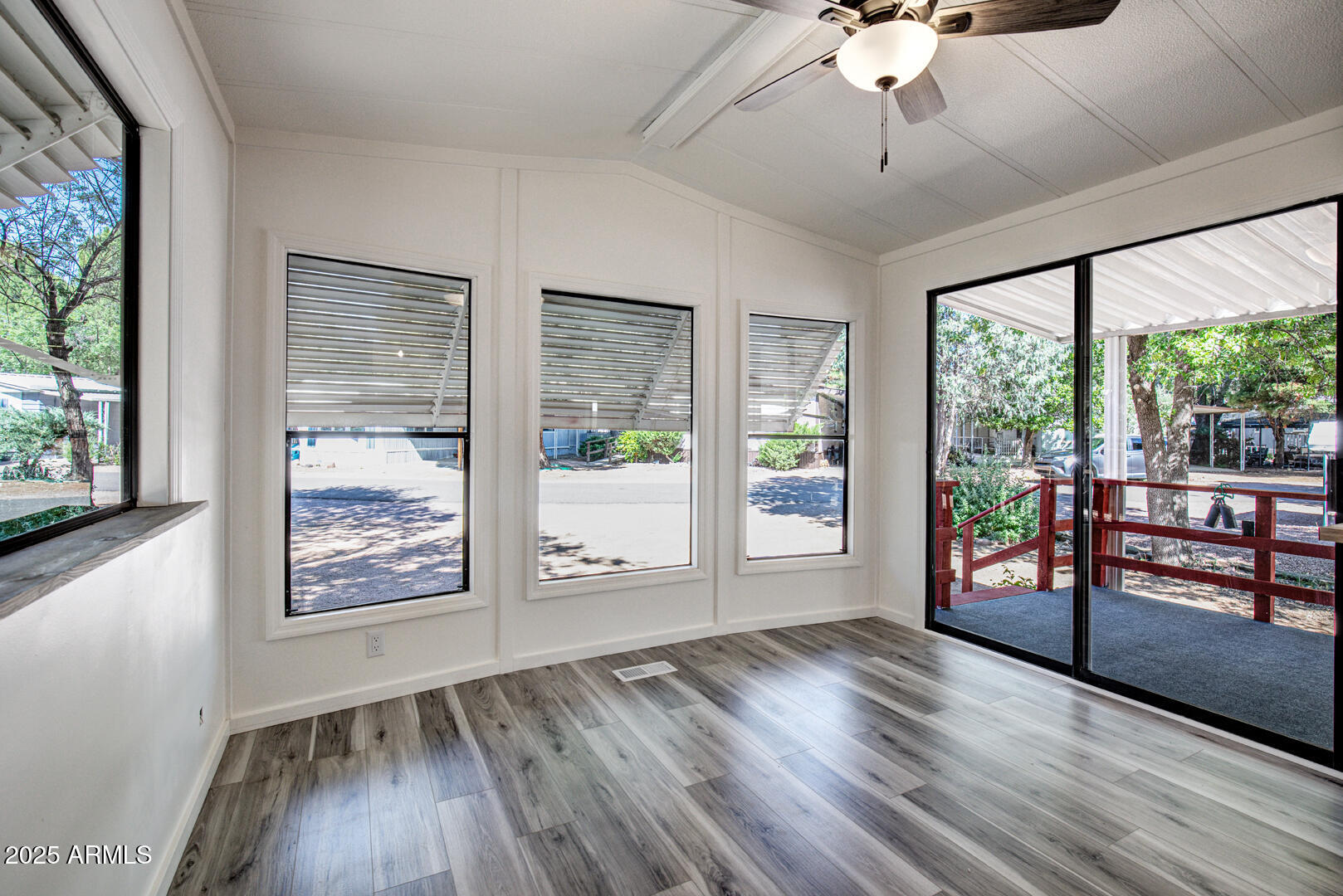 16 North Star Vale Road, Unit 11 Star Valley, AZ 85541 - Photo 7 of 24 a view of an empty room with window wooden floor