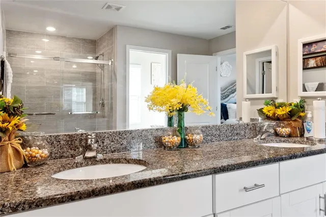a bathroom with a toilet a sink and a window