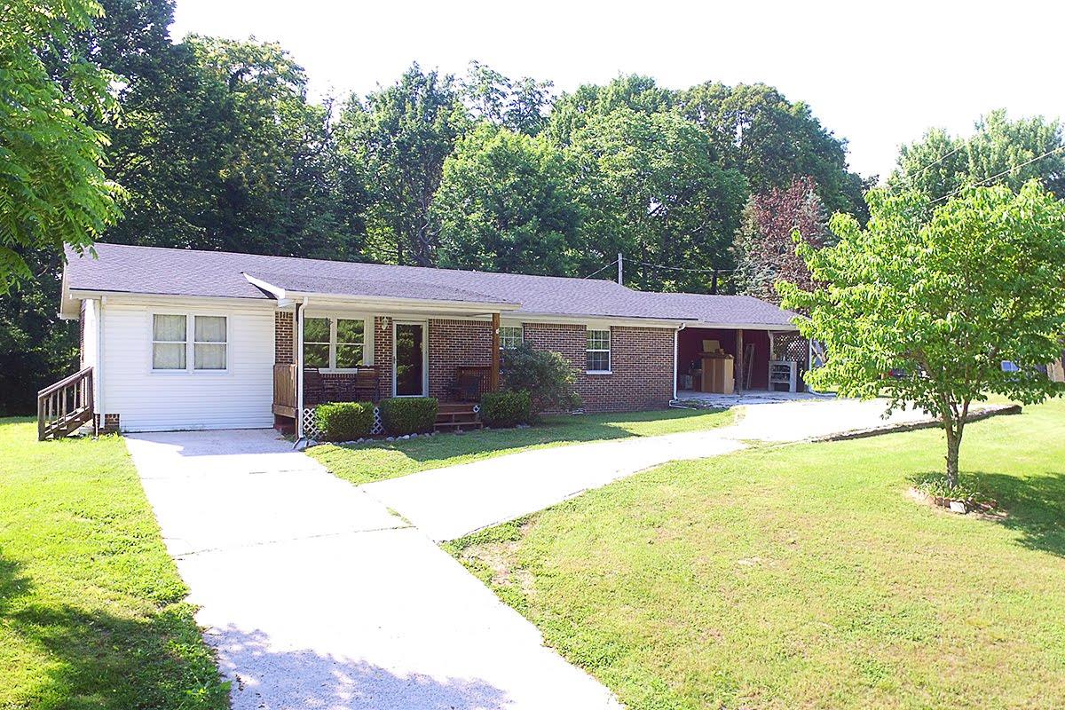2779 Dale Ridge Road Dowelltown, TN 37059 - Photo 1 of 20 a view of a house with a yard and tree s