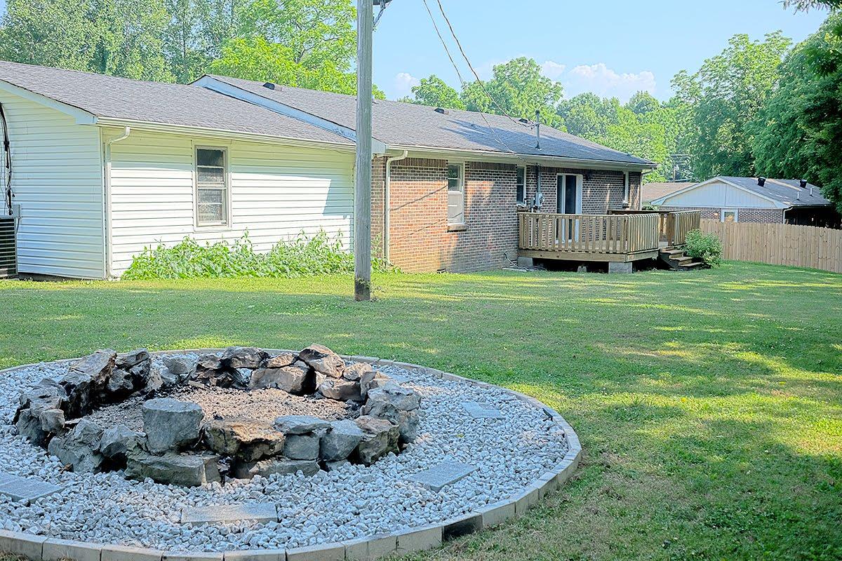 2779 Dale Ridge Road Dowelltown, TN 37059 - Photo 2 of 20 a view of a house with backyard and sitting area