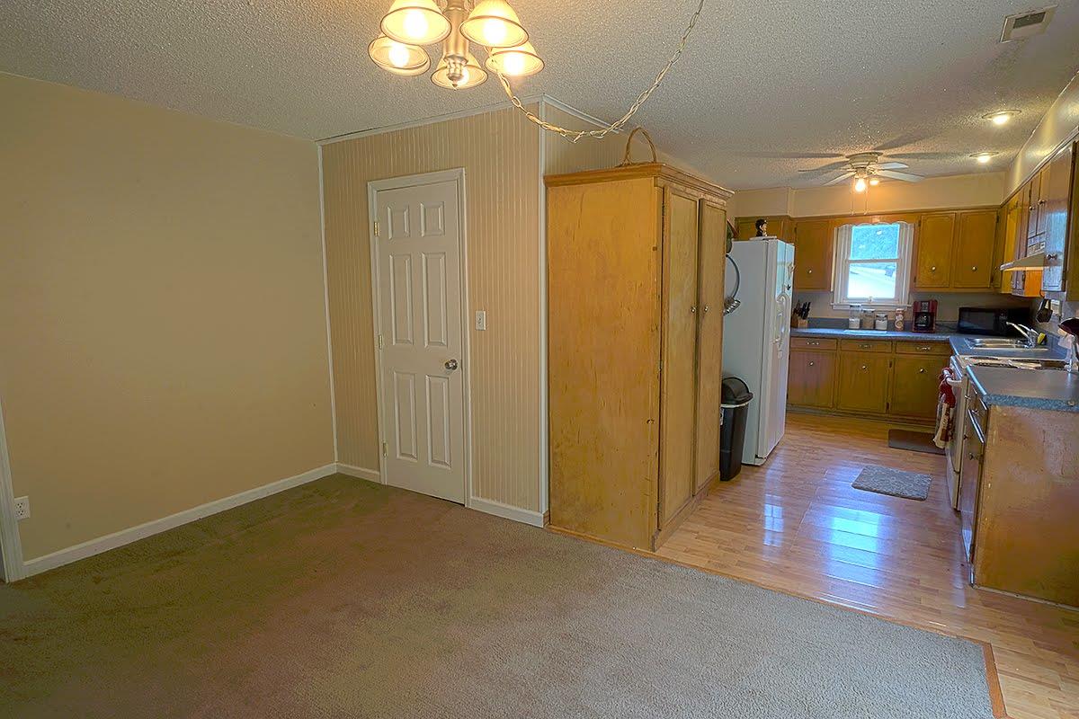 2779 Dale Ridge Road Dowelltown, TN 37059 - Photo 5 of 20 a view of a livingroom with a chandelier