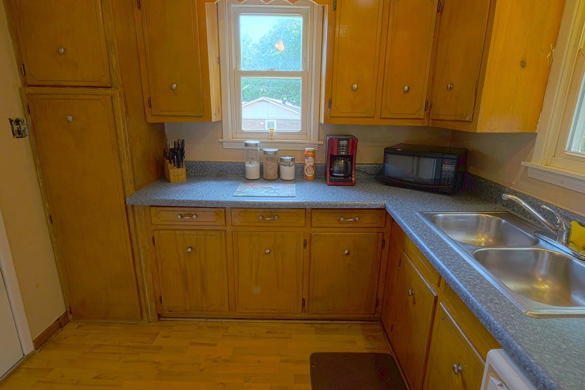 2779 Dale Ridge Road Dowelltown, TN 37059 - Photo 6 of 20 a kitchen with a sink and cabinets